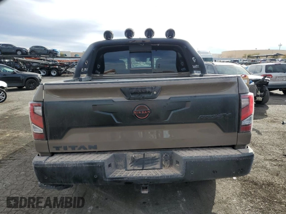 2024 Nissan Titan Pro-4X with VIN 1N6AA1ED3RN103011, listed as a Copart auction lot 87050954 with 8,829 mi miles and Salvage title. Bid and sale history available at DreamBid. Image 6.