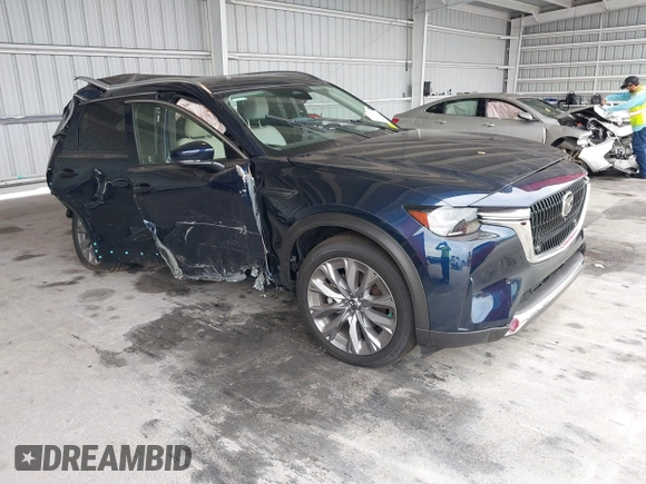 2024 Mazda CX-90 Premium Plus with VIN JM3KKEHD8R1186750, listed as a IAAI auction lot 41795353 with 5,144 mi miles and . Bid and sale history available at DreamBid. Image 1.