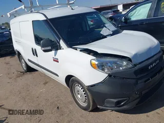 2019 Ram ProMaster City Cargo Tradesman z VIN ZFBHRFAB1K6N89591, wystawiony jako IAAI lot #41129142 z przebiegiem 63 225 mil mil oraz . Historia ofert i sprzedaży dostępna na DreamBid. Obrazek 1.