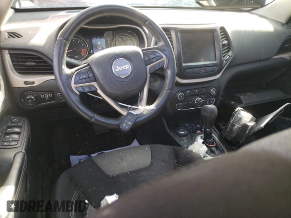 2014 Jeep Cherokee Altitude with VIN 1C4PJMCS0EW291247, listed as a Copart auction lot 47694115 with 124,775 mi miles and Salvage Title. Bid and sale history available at carsss.com. Image 8.
