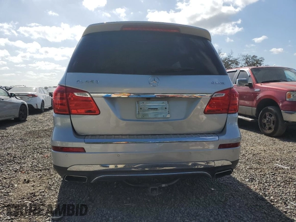 2014 Mercedes-Benz GL 450 z VIN 4JGDF7CEXEA348496, wystawiony jako Copart lot #55187005 z przebiegiem 150 359 mil mil oraz Czysty tytuł • Clean title. Historia ofert i sprzedaży dostępna na DreamBid. Obrazek 6.