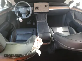 2023 Tesla Model Y Long Range z VIN 7SAYGDEE8PF816544, wystawiony jako Copart lot #57170485 z przebiegiem 74 598 mil mil oraz Szkoda całkowita • Salvage title. Historia ofert i sprzedaży dostępna na DreamBid. Obrazek 8.