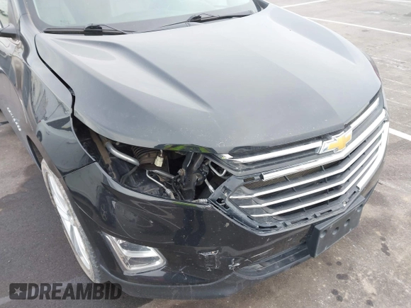 2021 Chevrolet Equinox Premier z VIN 2GNAXXEV4M6118442, wystawiony jako IAAI lot #41392148 z przebiegiem 92 170 mil mil oraz . Historia ofert i sprzedaży dostępna na DreamBid. Obrazek 6.