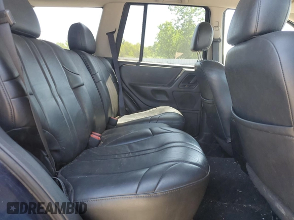 2004 Jeep Grand Cherokee Laredo with VIN 1J4GW48N34C425845, listed as a Copart auction lot 61200555 with 133,664 mi miles and Clean title. Bid and sale history available at DreamBid. Image 11.