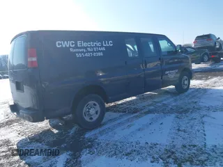 2014 Chevrolet Express Cargo Van with VIN 1GCWGGBA5E1205786, listed as a IAAI auction lot 41339085 with 201,460 mi miles. Bid and sale history available at carsss.com. Image 4.