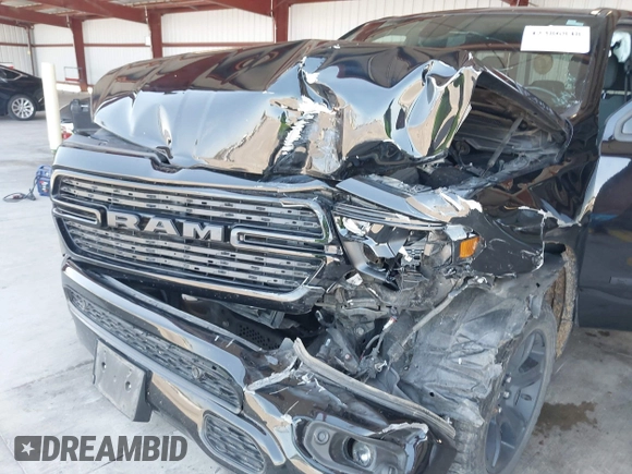 2021 Ram 1500 Big Horn with VIN 1C6SRFBT2MN562927, listed as a IAAI auction lot 42386848 with 83,858 mi miles and . Bid and sale history available at DreamBid. Image 6.