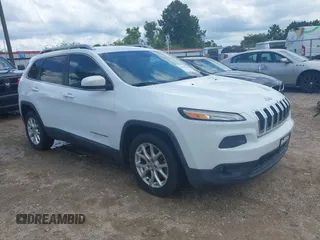 2014 Jeep Cherokee Latitude z VIN 1C4PJLCB0EW212833, wystawiony jako IAAI lot #42352683 z przebiegiem 165 358 mil mil oraz . Historia ofert i sprzedaży dostępna na DreamBid. Obrazek 1.