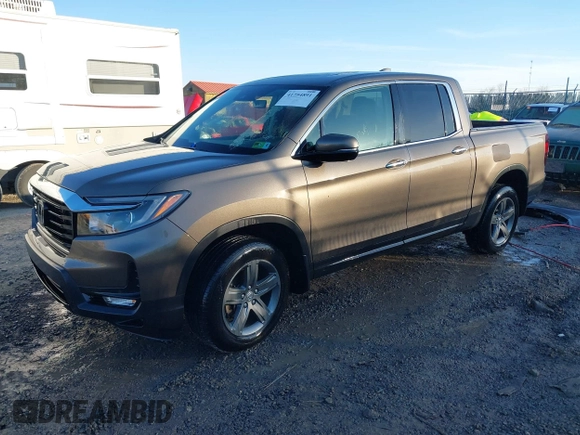 2022 Honda Ridgeline RTL-E with VIN 5FPYK3F79NB005152, listed as a IAAI auction lot 41754891 with 60,191 mi miles and . Bid and sale history available at DreamBid. Image 2.