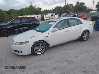 2008 Acura TL with VIN 19UUA66218A018427, listed as a IAAI auction lot 42016962 with 240,865 mi miles. Bid and sale history available at carsss.com. Image 2.