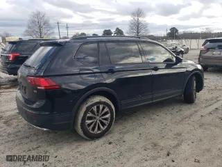 2018 Volkswagen Tiguan S with VIN 3VV1B7AXXJM105874, listed as a Copart auction lot 86565734 with 100,901 mi miles and Salvage Title. Bid and sale history available at carsss.com. Image 3.