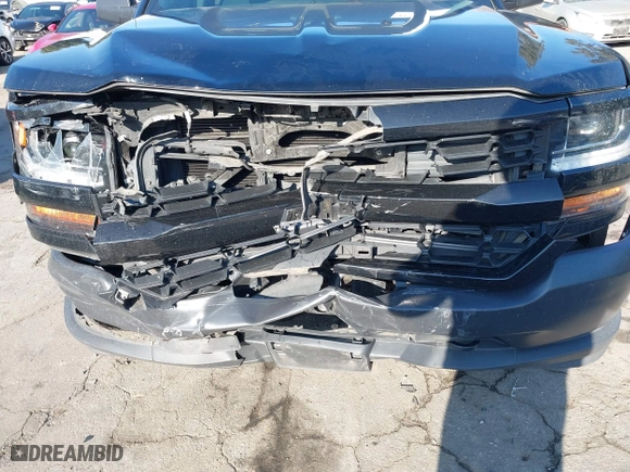2018 Chevrolet Silverado 1500 Work Truck with VIN 1GCVKNEH3JZ247828, listed as a IAAI auction lot 41537573 with 134,684 mi miles. Bid and sale history available at carsss.com. Image 6.