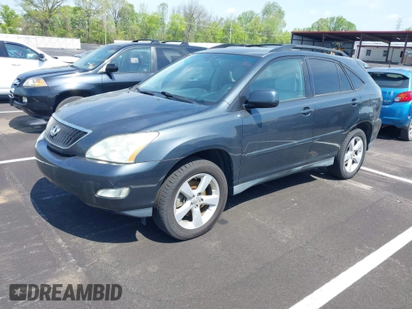 2007 Lexus RX with VIN 2T2GK31U07C021695, listed as a IAAI auction lot 42032252 with 146,023 mi miles. Bid and sale history available at carsss.com. Image 2.
