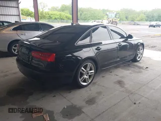 2014 Audi A6 Premium Plus with VIN WAUGFAFC1EN164580, listed as a IAAI auction lot 42220550 with 112,528 mi miles and . Bid and sale history available at DreamBid. Image 4.