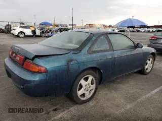 1995 Nissan 240SX z VIN JN1AS44D2SW015735, wystawiony jako Copart lot #59525185 z przebiegiem 165 974 mil mil oraz Czysty tytuł • Clean title. Historia ofert i sprzedaży dostępna na DreamBid. Obrazek 4.