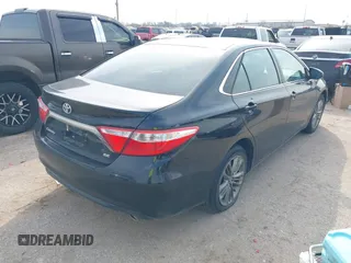 2015 Toyota Camry XLE with VIN 4T1BF1FK6FU985908, listed as a IAAI auction lot 41627697 with 232,066 mi miles. Bid and sale history available at carsss.com. Image 4.