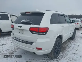 2018 Jeep Grand Cherokee Laredo E with VIN 1C4RJFAG1JC499457, listed as a IAAI auction lot 41379459 with 127,344 mi miles and . Bid and sale history available at DreamBid. Image 4.