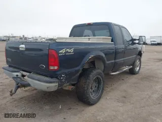 2001 Ford Super Duty F-350 SRW XL with VIN 1FTSX31L21ED36994, listed as a IAAI auction lot 41358290 with 268,344 mi miles. Bid and sale history available at carsss.com. Image 4.
