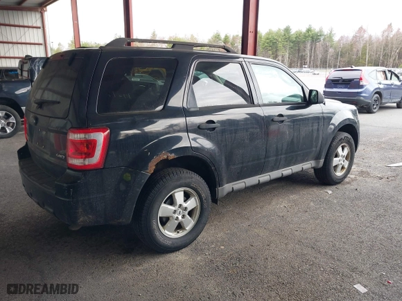 2009 Ford Escape XLT with VIN 1FMCU93G79KC30405, listed as a IAAI auction lot 42043034 with 136,086 mi miles. Bid and sale history available at carsss.com. Image 4.