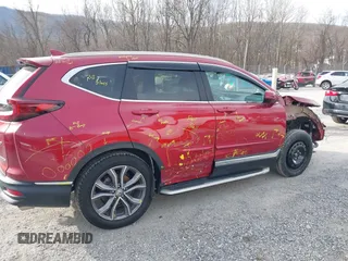 2020 Honda CR-V Touring with VIN 2HKRW2H90LH649017, listed as a IAAI auction lot 41701827 with 50,565 mi miles and . Bid and sale history available at DreamBid. Image 13.