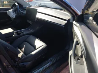 2022 Tesla Model 3 with VIN 5YJ3E1EA3NF165054, listed as a IAAI auction lot 41805729 with 225,773 mi miles. Bid and sale history available at carsss.com. Image 5.