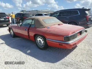 1996 Jaguar XJS with VIN SAJNX2747TC224957, listed as a Copart auction lot 76999844 with Not Provided miles and Salvage Title. Bid and sale history available at carsss.com. Image 2.