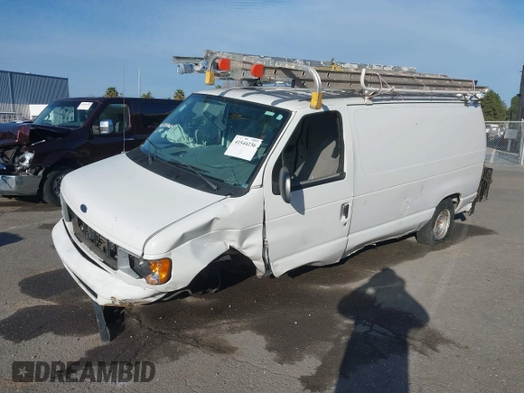 2000 Ford Econoline Cargo with VIN 1FTRE1427YHA09155, listed as a IAAI auction lot 41544236 with 32,275 mi miles. Bid and sale history available at carsss.com. Image 16.