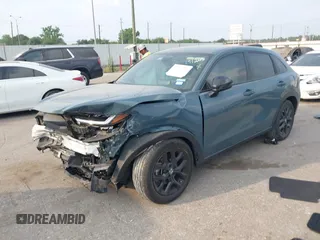 2024 Honda HR-V Sport z VIN 3CZRZ1H56RM733208, wystawiony jako IAAI lot #42304031 z przebiegiem 23 389 mil mil oraz . Historia ofert i sprzedaży dostępna na DreamBid. Obrazek 18.