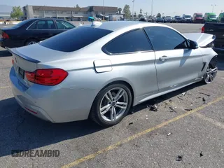 2014 BMW 4 Series 428i xDrive with VIN WBA3N9C54EF721188, listed as a IAAI auction lot 42143305 with Not provided miles and . Bid and sale history available at DreamBid. Image 4.