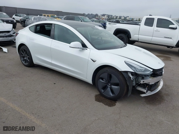 2019 Tesla Model 3 Long Range with VIN 5YJ3E1EB2KF361541, listed as a IAAI auction lot 41859373 with 54,664 mi miles. Bid and sale history available at carsss.com. Image 1.