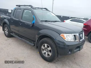 2013 Nissan Frontier SV z VIN 1N6AD0EVXDN740402, wystawiony jako IAAI lot #42367191 z przebiegiem 101 366 mil mil oraz . Historia ofert i sprzedaży dostępna na DreamBid. Obrazek 1.