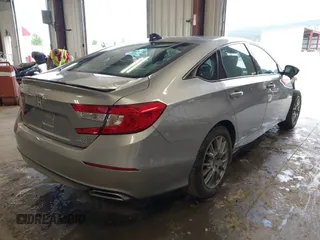 2021 Honda Accord Sport with VIN 1HGCV2F38MA015147, listed as a IAAI auction lot 42402213 with 31,715 mi miles and . Bid and sale history available at DreamBid. Image 4.