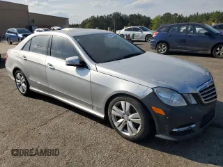 2013 Mercedes-Benz E 400 Sport with VIN WDDHF9FBXDA746251, listed as a Copart auction lot 52746845 with 125,314 mi miles and Salvage Title. Bid and sale history available at DreamBid. Image 4.