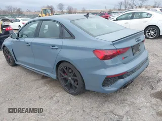 2023 Audi RS 3 with VIN WUAG4DGY9PA905303, listed as a IAAI auction lot 41728962 with 16,896 mi miles. Bid and sale history available at carsss.com. Image 3.