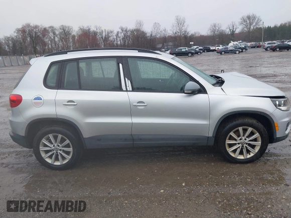 2017 Volkswagen Tiguan S with VIN WVGBV7AX4HK051172, listed as a IAAI auction lot 41843182 with 160,010 mi miles and . Bid and sale history available at DreamBid. Image 14.