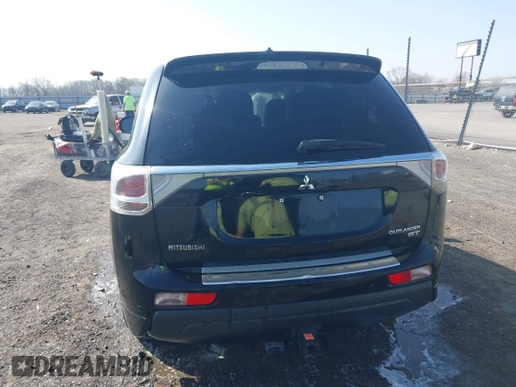 2014 Mitsubishi Outlander GT with VIN JA4JZ4AX8EZ016070, listed as a IAAI auction lot 41771934 with 157,724 mi miles and . Bid and sale history available at DreamBid. Image 16.