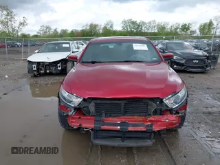 2018 Ford Taurus SEL z VIN 1FAHP2E85JG124997, wystawiony jako IAAI lot #42194985 z przebiegiem 86 456 mil mil oraz . Historia ofert i sprzedaży dostępna na DreamBid. Obrazek 13.