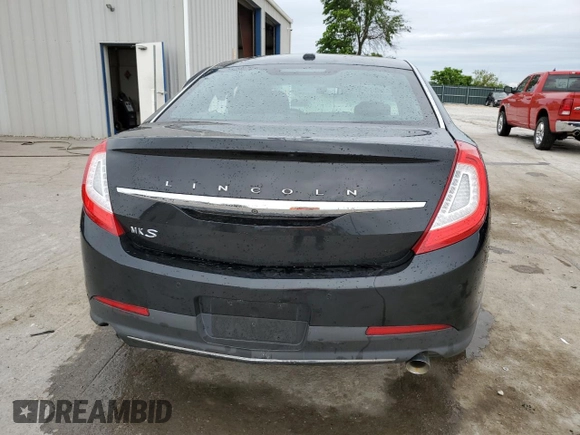 2015 Lincoln MKS z VIN 1LNHL9DK6FG604609, wystawiony jako Copart lot #56243135 z przebiegiem 82 622 mil mil oraz Szkoda całkowita • Salvage title. Historia ofert i sprzedaży dostępna na DreamBid. Obrazek 6.