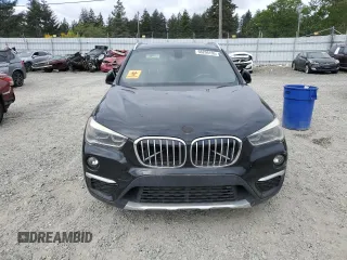 2017 BMW X1 xDrive28i z VIN WBXHT3Z37H4A54088, wystawiony jako Copart lot #56209195 z przebiegiem 135 026 mil mil oraz Tytuł czysty. Historia ofert i sprzedaży dostępna na DreamBid. Obrazek 5.
