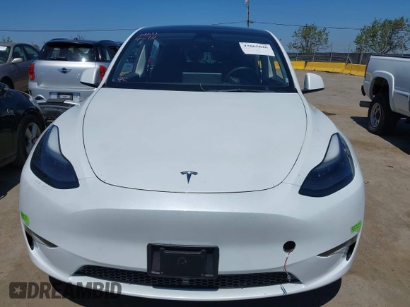 2023 Tesla Model Y Long Range with VIN 7SAYGDEE1PF660444, listed as a IAAI auction lot 42065046 with 23,601 mi miles and . Bid and sale history available at DreamBid. Image 13.