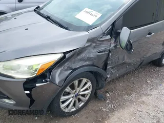 2013 Ford Escape SEL with VIN 1FMCU0HX4DUC83404, listed as a IAAI auction lot 41285095 with 199,024 mi miles. Bid and sale history available at carsss.com. Image 6.