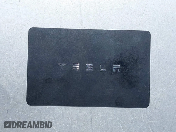 2020 Tesla Model Y Long Range with VIN 5YJYGDEE2LF058515, listed as a IAAI auction lot 41932748 with 62,885 mi miles and . Bid and sale history available at DreamBid. Image 11.