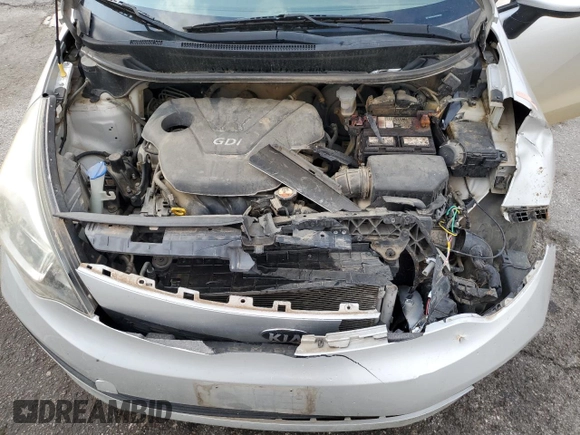 2013 Kia Rio LX z VIN KNADM4A35D6280066, wystawiony jako Copart lot #57293585 z przebiegiem 129 281 mil mil oraz Szkoda całkowita • Salvage title. Historia ofert i sprzedaży dostępna na DreamBid. Obrazek 11.
