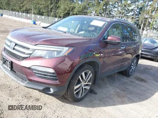 2016 Honda Pilot Touring with VIN 5FNYF6H99GB094933, listed as a IAAI auction lot 41967730 with 98,841 mi miles. Bid and sale history available at carsss.com. Image 2.