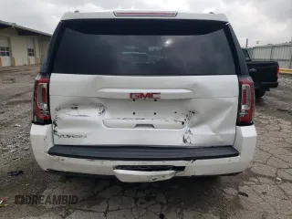 2016 GMC Yukon SLT with VIN 1GKS2BKC0GR265761, listed as a Copart auction lot 65645484 with 130,352 mi miles and Salvage Title. Bid and sale history available at carsss.com. Image 6.