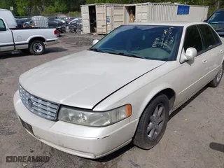 2001 Cadillac Seville Luxury SLS w/Monochrome Pkg with VIN 1G6KS54Y71U223875, listed as a IAAI auction lot 41970460 with 119,982 mi miles. Bid and sale history available at carsss.com. Image 2.