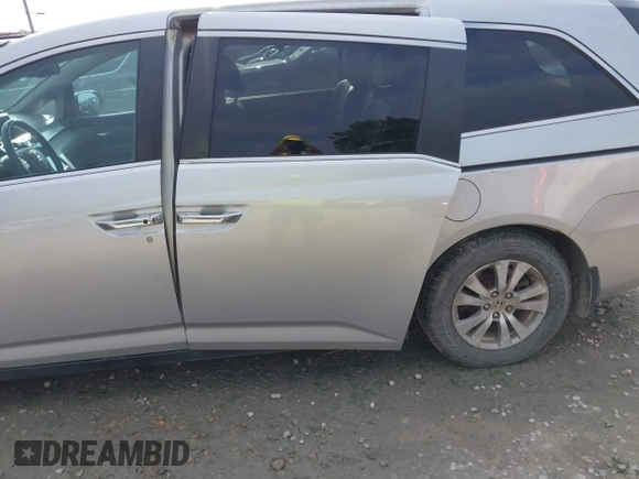 2014 Honda Odyssey EX-L with VIN 5FNRL5H62EB101392, listed as a IAAI auction lot 42689945 with 289,242 mi miles and . Bid and sale history available at DreamBid. Image 6.
