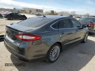 2016 Ford Fusion Titanium with VIN 3FA6P0D9XGR406186, listed as a Copart auction lot 50601175 with 207,220 mi miles and Salvage title. Bid and sale history available at DreamBid. Image 3.