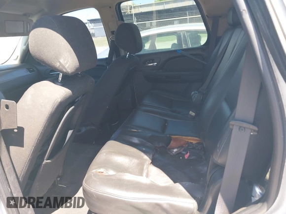 2010 Chevrolet Tahoe LS with VIN 1GNMCAE05AR263340, listed as a IAAI auction lot 41998453 with 256,944 mi miles and . Bid and sale history available at DreamBid. Image 8.