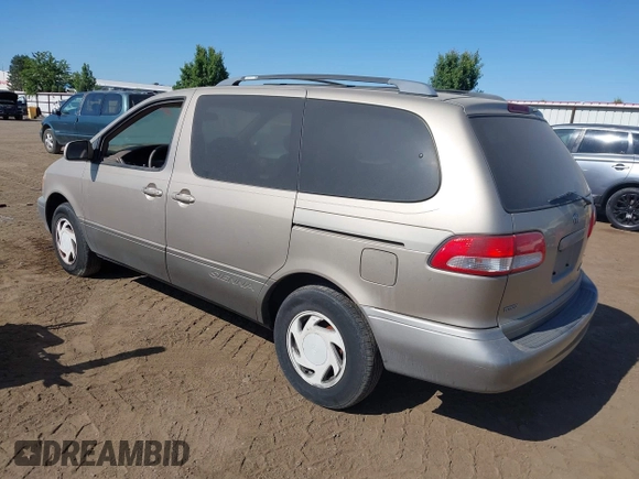 2002 Toyota Sienna LE with VIN 4T3ZF13C72U419558, listed as a IAAI auction lot 42531912 with 246,872 mi miles and . Bid and sale history available at DreamBid. Image 3.