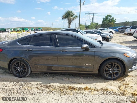 2018 Ford Fusion Hybrid SE with VIN 3FA6P0LUXJR119735, listed as a IAAI auction lot 41772187 with NaN miles. Bid and sale history available at carsss.com. Image 13.